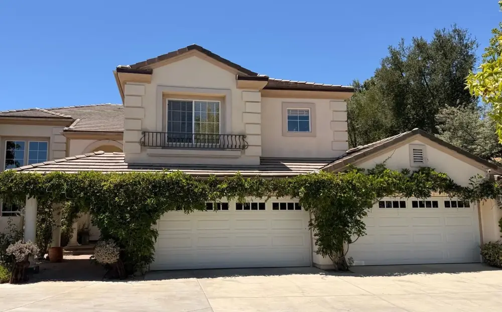 Front of the Agoura Hills home after the tile roof re-felt, with the original concrete tile on the street-facing slopes